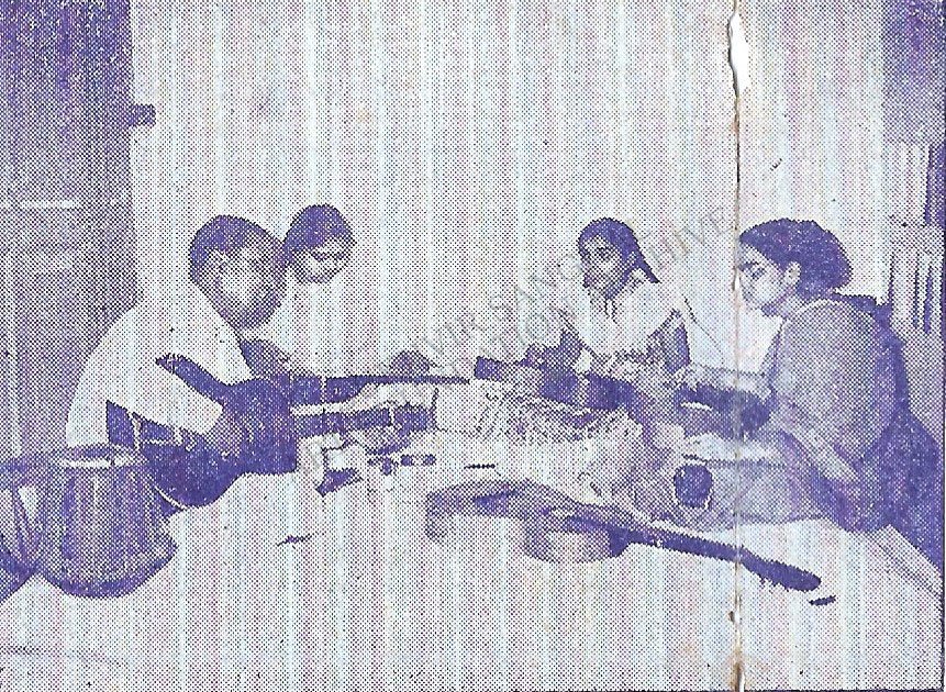 Archival photograph of students receiving guitar instruction at Kala Bharti, Prayagraj, as part of the institution's multidisciplinary arts curriculum.